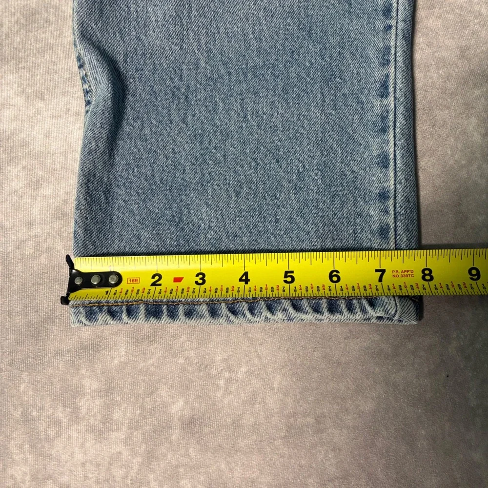 Vintage Levis 550 Relaxed Fit Tapered Leg Jeans Light Wash Blue 36x29 Mens 90s